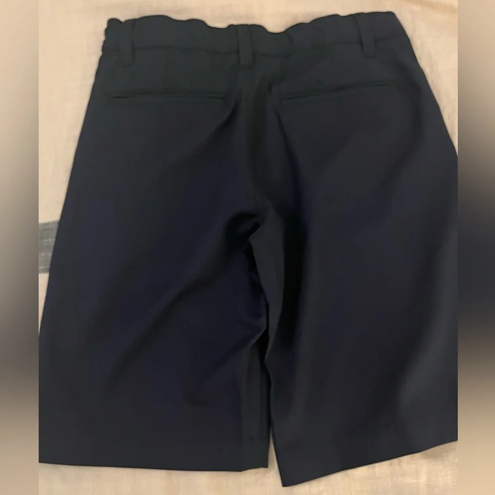 Boys adjustable waist navy school shorts.  Sz 12.  100% poly.  smoke free home.