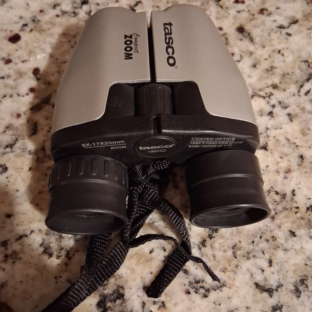 Tasco Compact Zoom Binoculars With Soft Case.