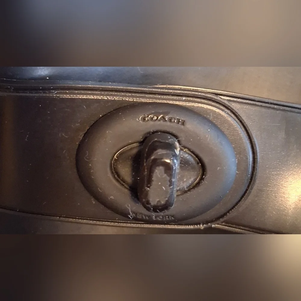 Coach nearly unworn