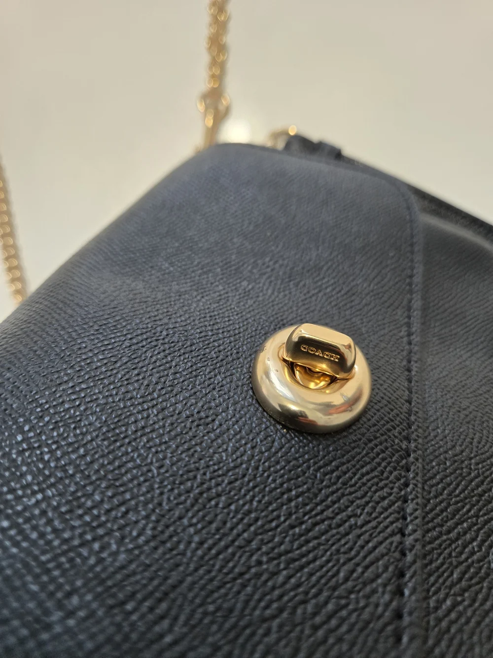 Coach sleek black