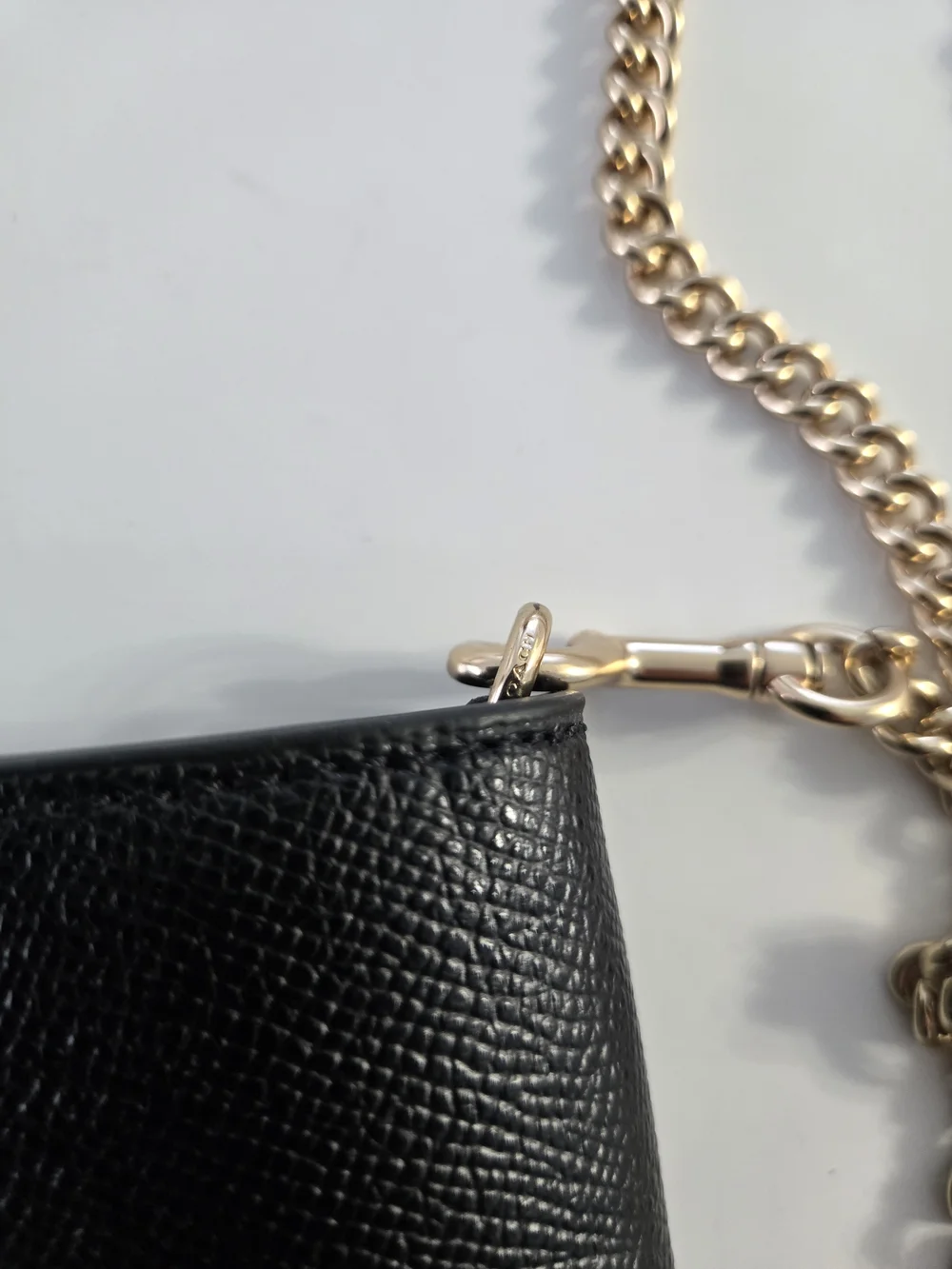 Coach sleek black