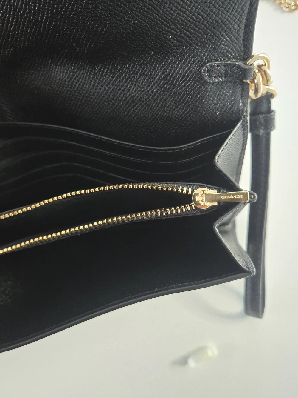 Coach sleek black