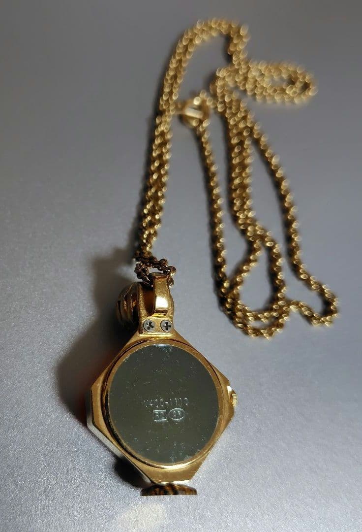 tasaki pendant
